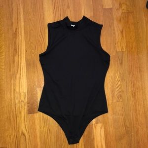 Sleeveless turtleneck bodysuit